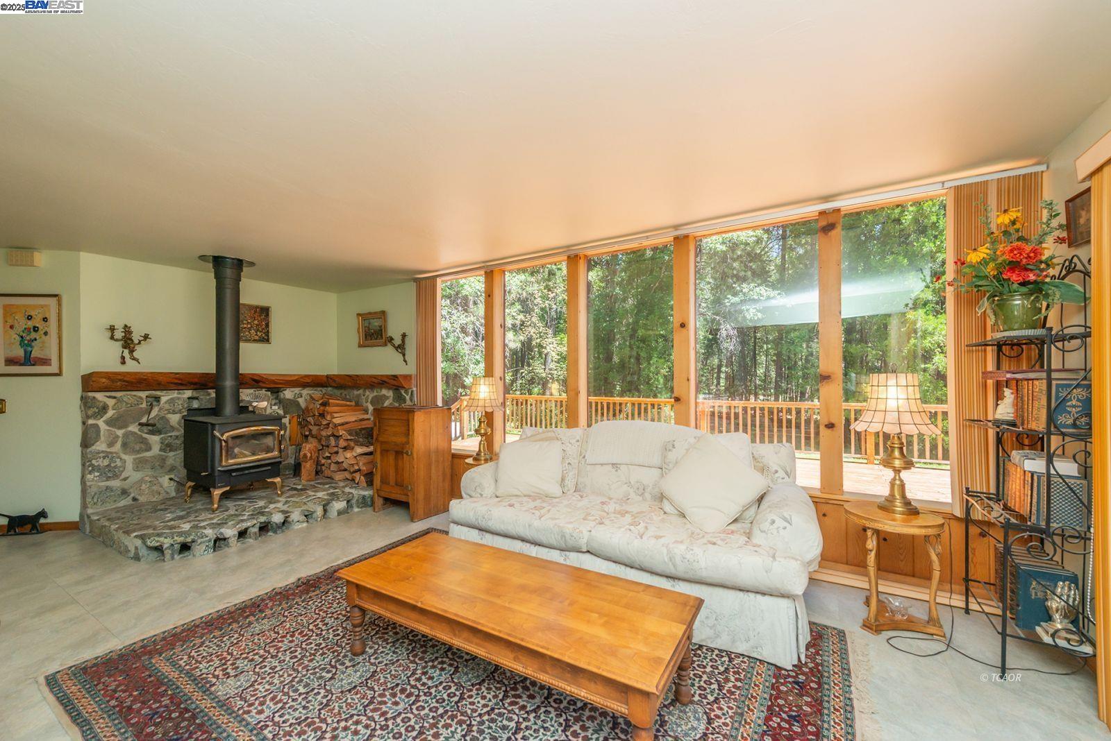30 Dorleska Court Trinity Center, CA 96091 - Photo 10 of 50 a living room with furniture city view and large windows