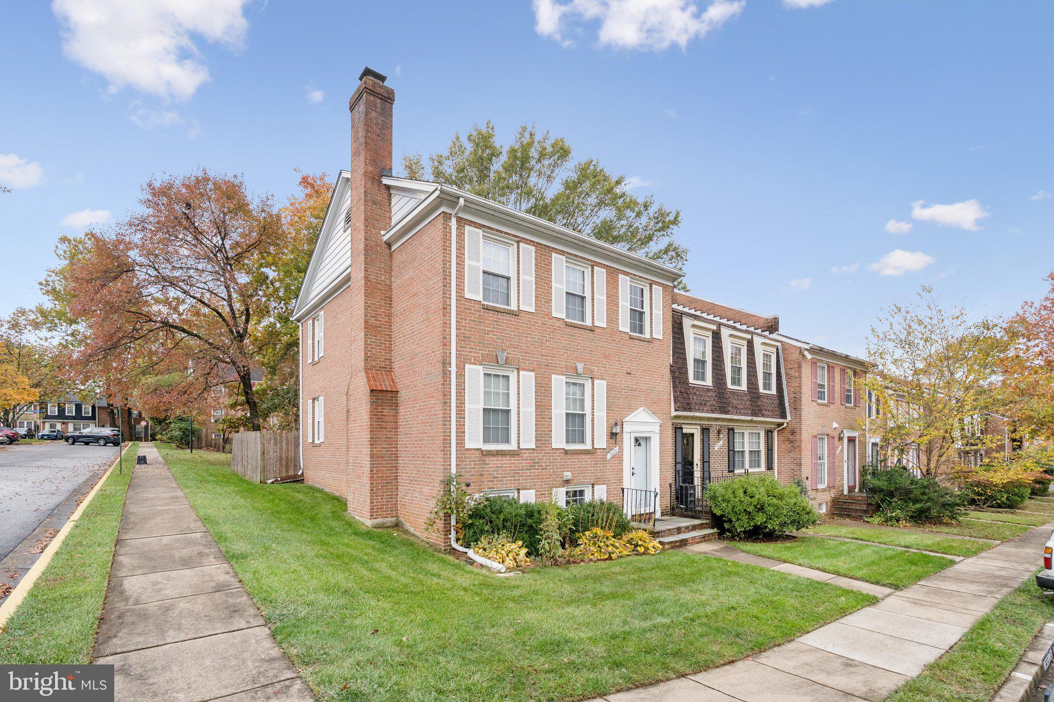 7029 Bradwood Court Springfield, VA 22151 - Photo 2 of 43 a front view of a house with a yard