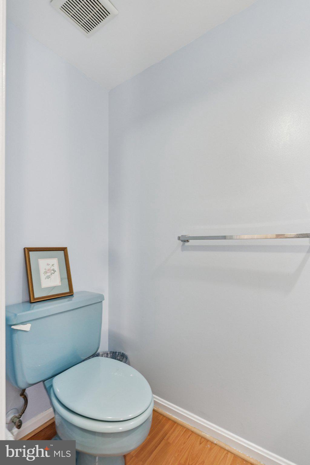 7029 Bradwood Court Springfield, VA 22151 - Photo 26 of 43 a white toilet sitting next to a shower