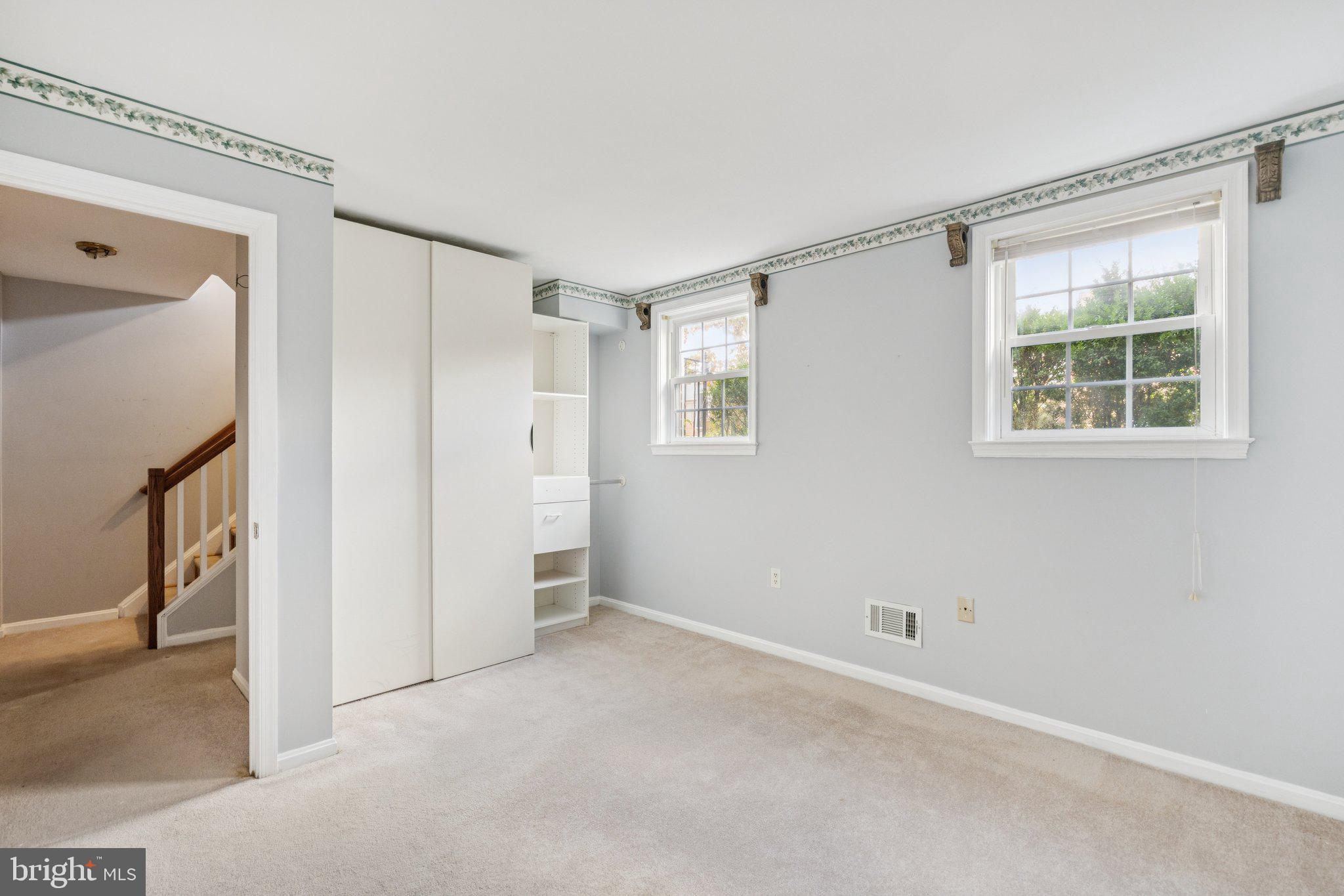 7029 Bradwood Court Springfield, VA 22151 - Photo 29 of 43 a view of an empty room with a window