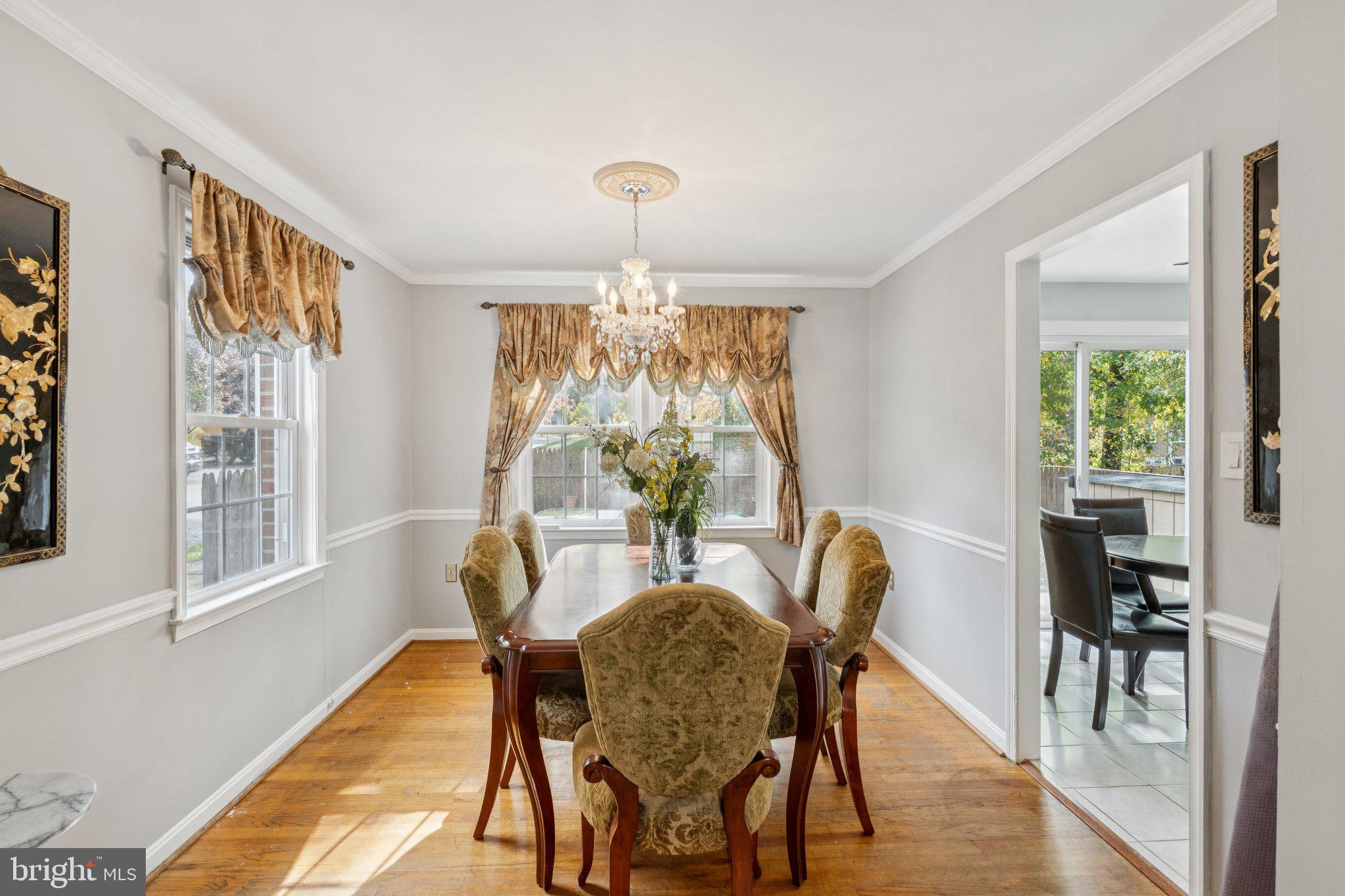 7029 Bradwood Court Springfield, VA 22151 - Photo 8 of 43 a view of a dining room with furniture window and outside view