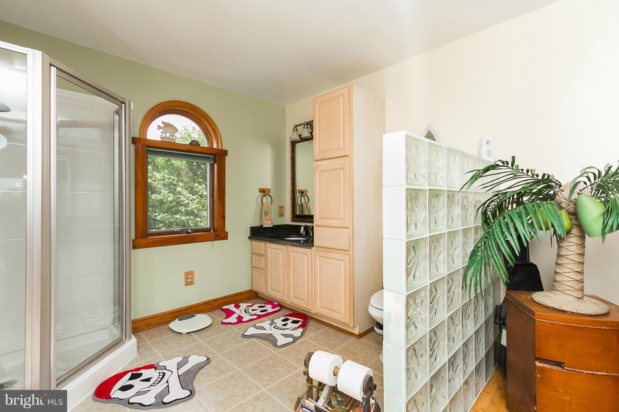 9103 Cuckold Point Road Baltimore, MD 21219 - Photo 14 of 28 a view of entryway with wooden floor and a rug
