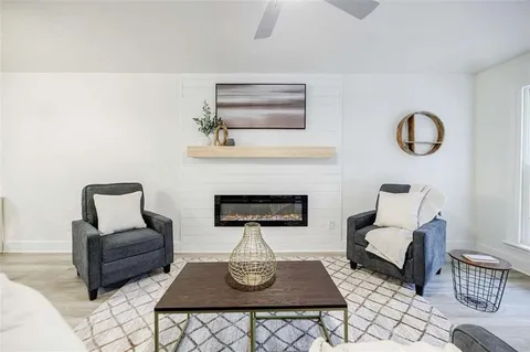 a kitchen with a table and chairs in it