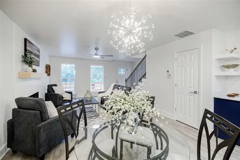 a kitchen with a table and chairs in it