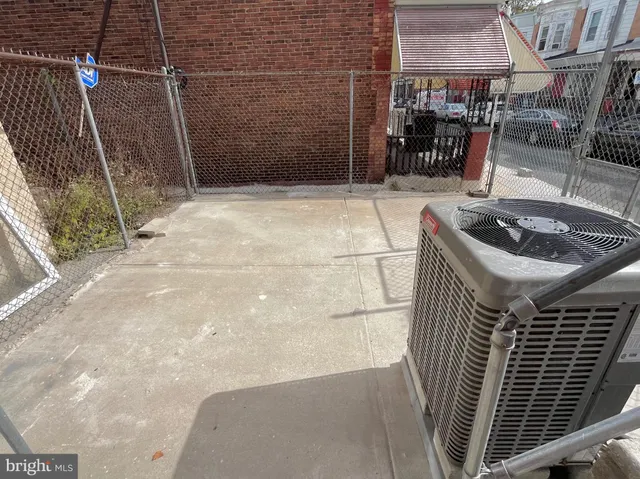 a view of a room with wooden walls