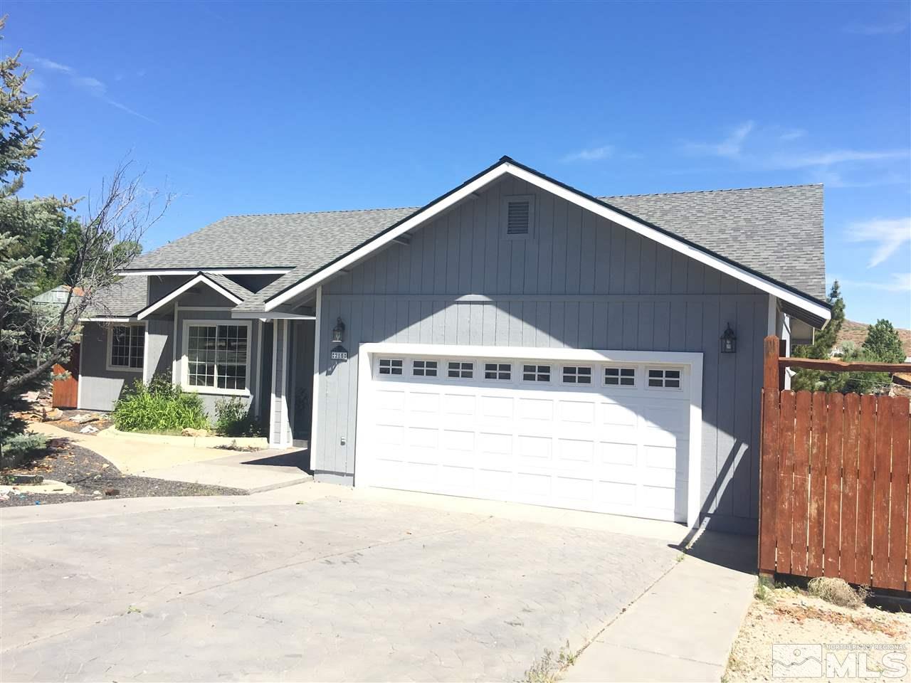 215 Koenig Circle Reno, NV 89506 - Photo 1 of 1 a front view of a house with a yard