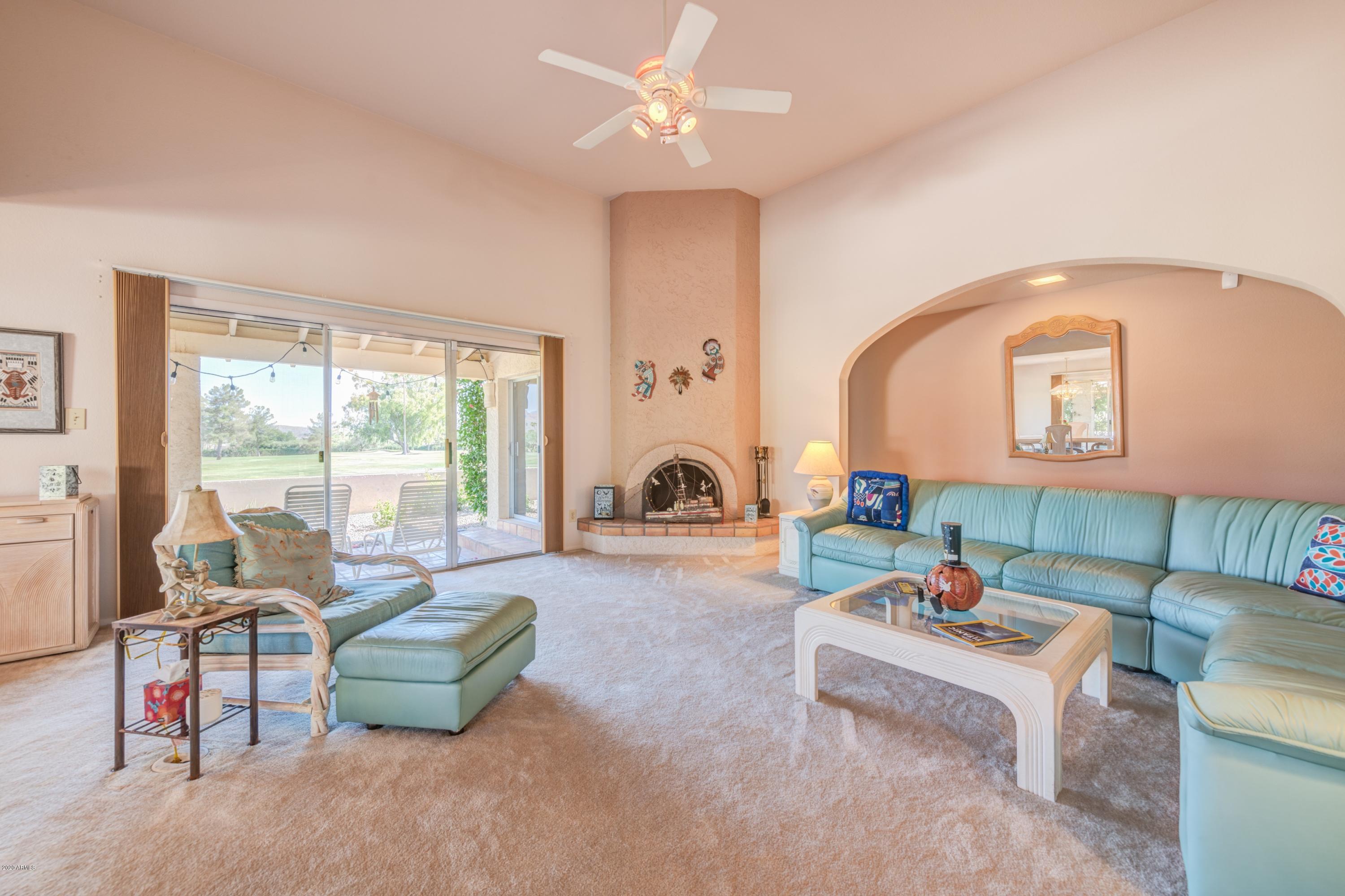 26215 North Loredo Lane Rio Verde, AZ 85263 - Photo 6 of 32 LIVING ROOM + FIREPLACE