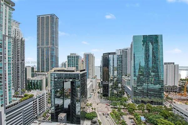 a view of city with tall buildings