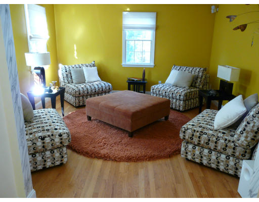 15 Spring Street Lexington, MA 02421 - Photo 4 of 16 a bedroom with bed and a couch