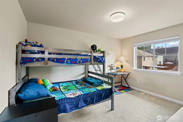 a living room with a couch and a table