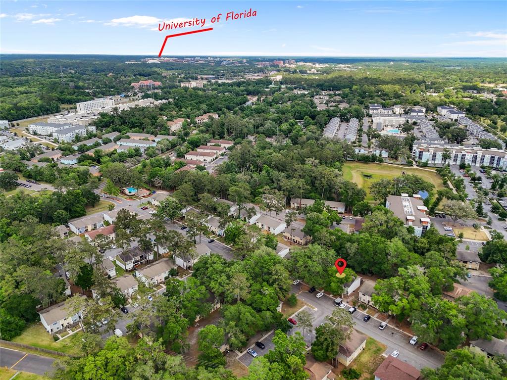 2219 Southwest 39th Way Gainesville, FL 32607 - Photo 2 of 17 an aerial view of a city with lots of residential buildings
