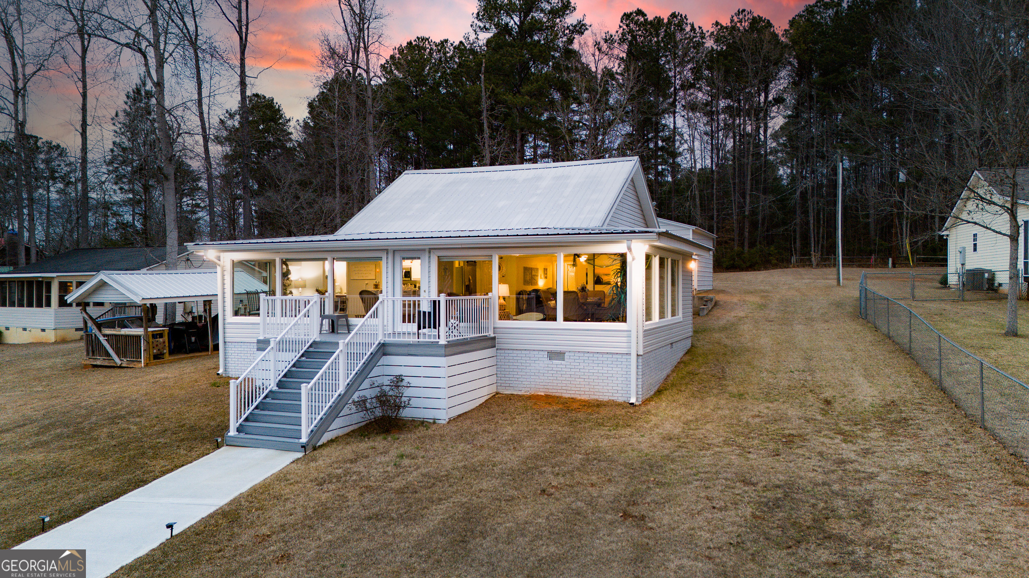 a view of swimming pool with a patio