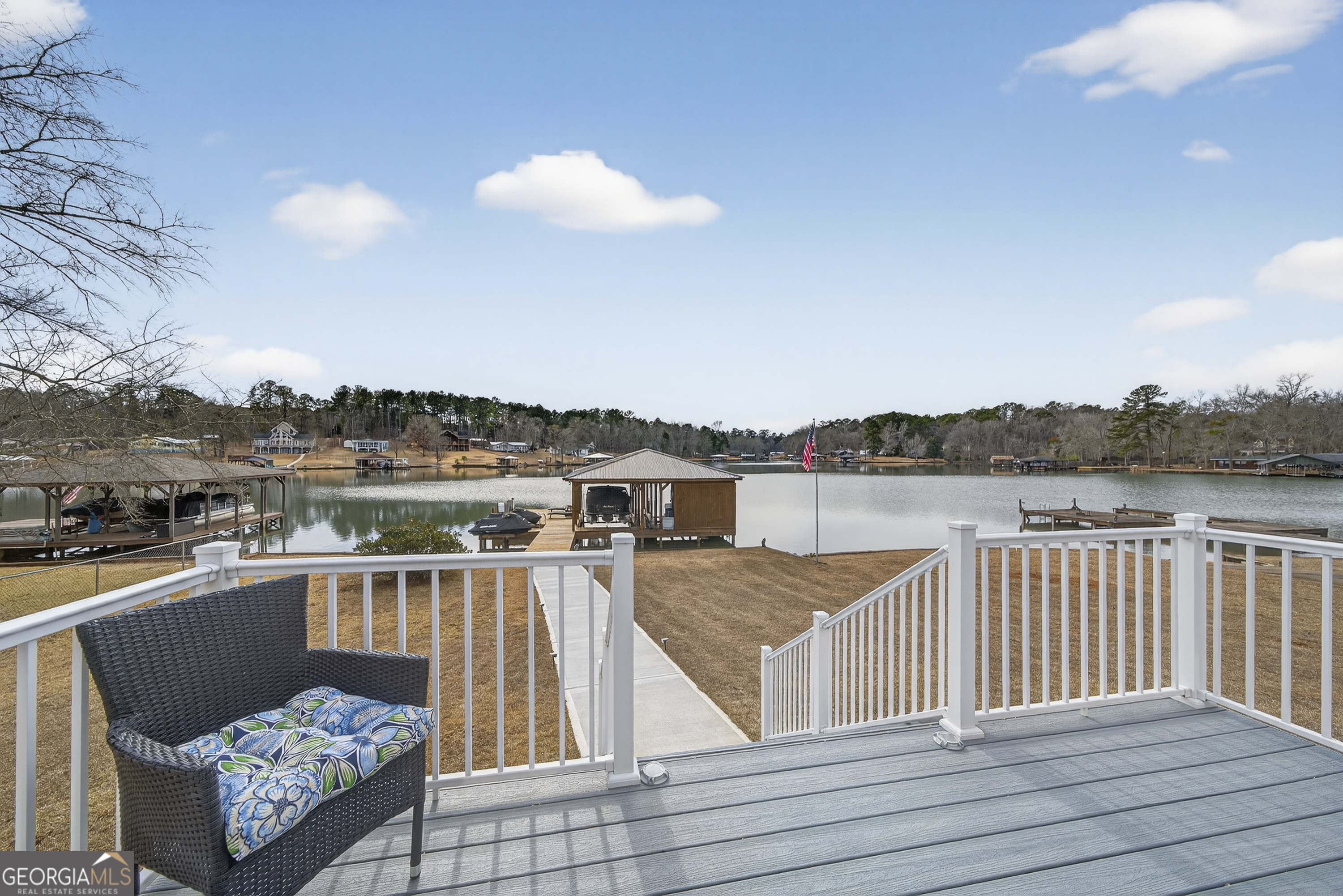 285 Clubhouse Road Eatonton, GA 31024 - Photo 41 of 44 a view of a roof deck with couches and city view