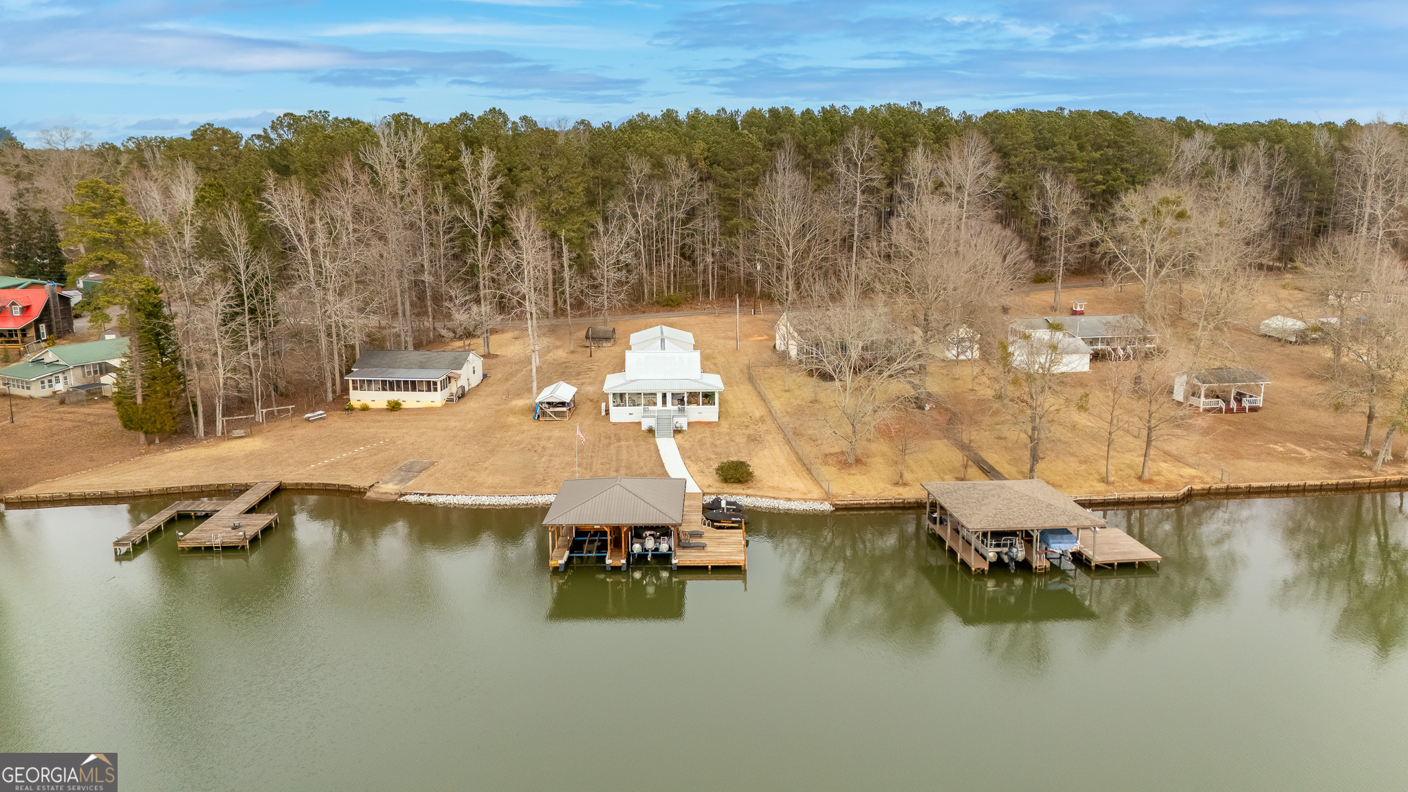285 Clubhouse Road Eatonton, GA 31024 - Photo 8 of 44 an aerial view of residential house with outdoor space and lake view