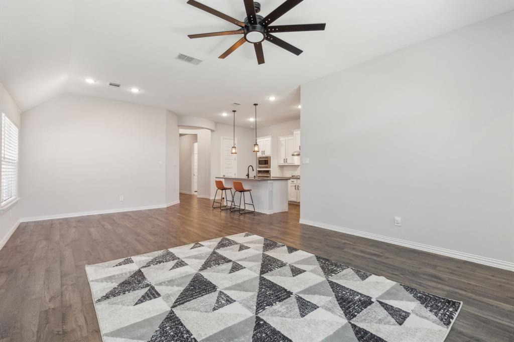 1918 Holy Unity Lane Wylie, TX 75098 - Photo 5 of 19 a living room with a couch