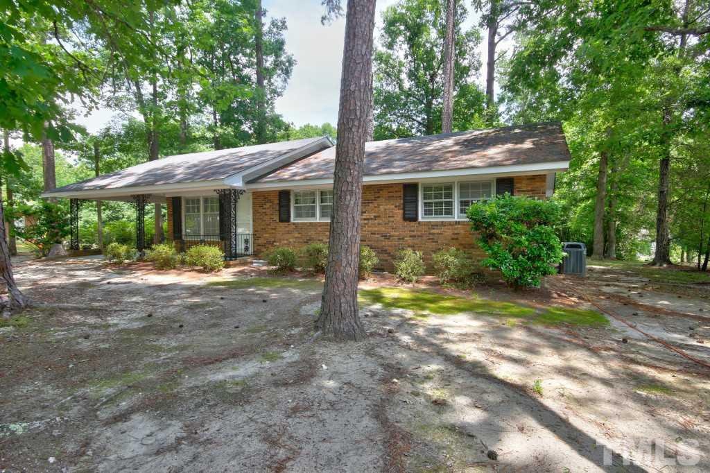 1632 Marshburn Road Wendell, NC 27591 - Photo 1 of 19 Wonderful investment property or perfect for first time home buyers. Brick home with carport and 3 bedrooms/2 full baths. Very large lot with just under an acre at .81