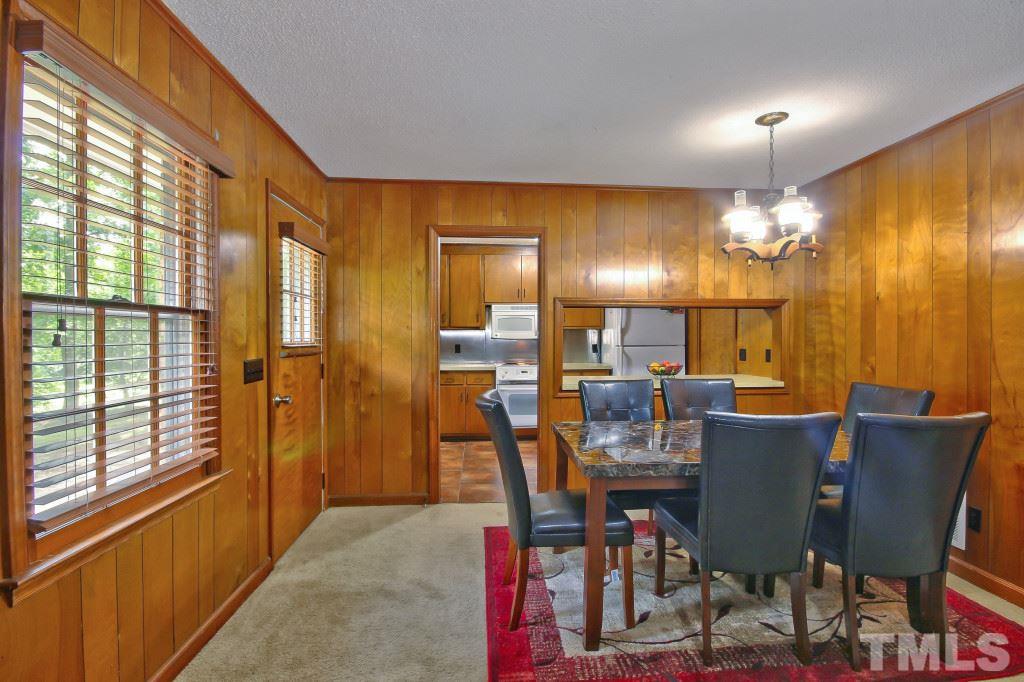 1632 Marshburn Road Wendell, NC 27591 - Photo 8 of 19 Separate dining area with a breakfast bar looking in to the kitchen so you can talk with family while making dinner!