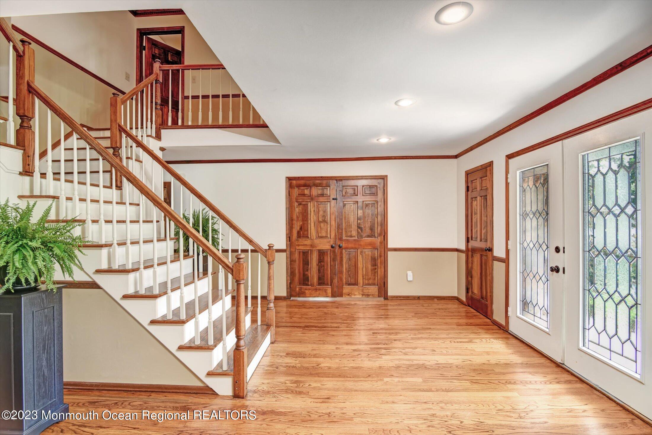 232 School Road Marlboro, NJ 07746 - Photo 6 of 46 Grand Foyer with Split Stair Case