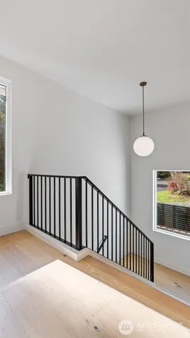 a bedroom with bed and window