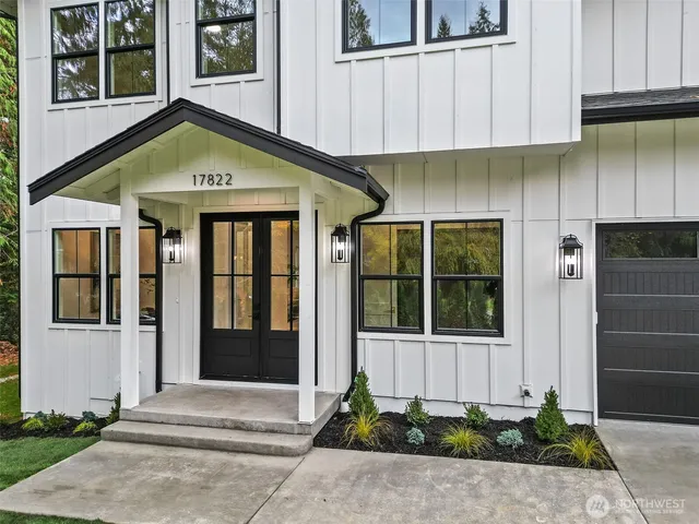 a front view of a house with a garage