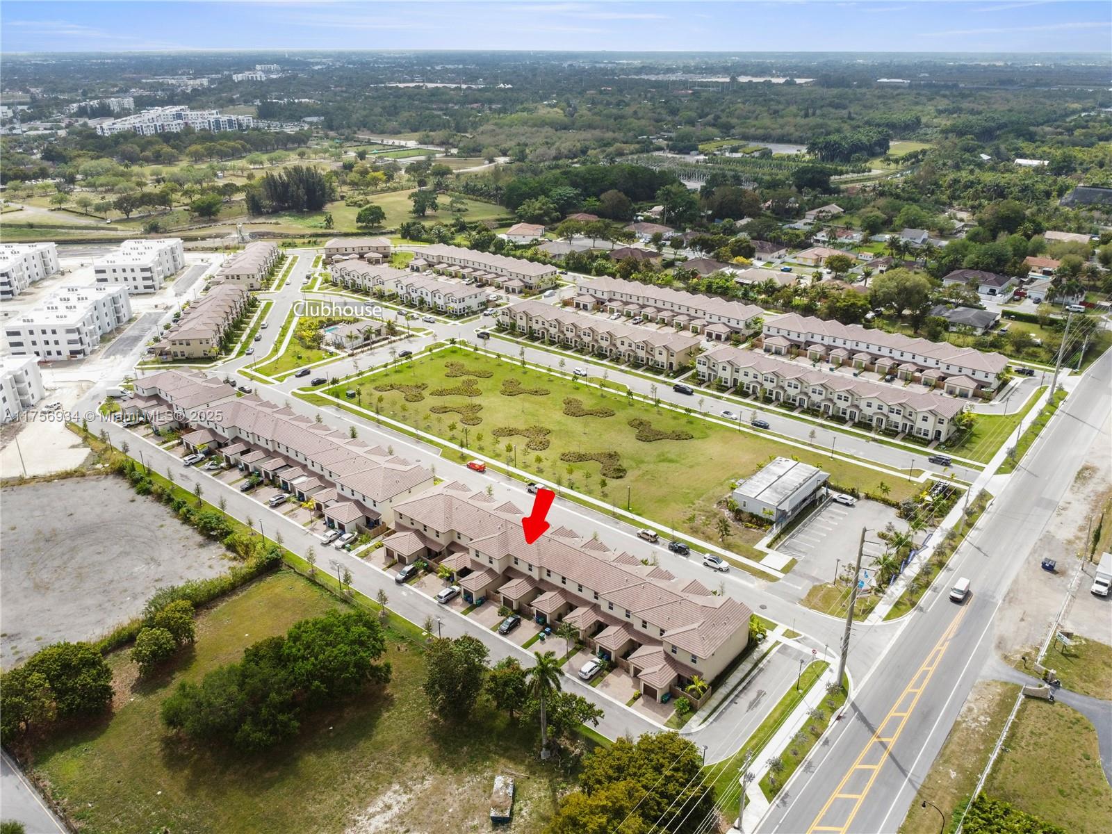 26431 Southwest 148th Avenue Homestead, FL 33032 - Photo 25 of 29 an aerial view of residential houses with outdoor space and ocean view
