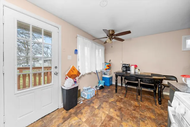 a work room with furniture and window