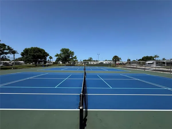 a tennis court with view of tennis court