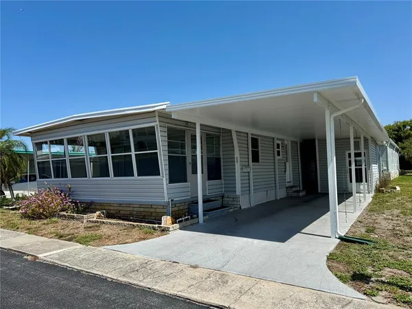 a front view of a house having yard