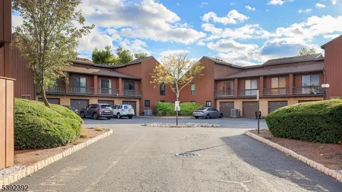 front view of a house with a garden