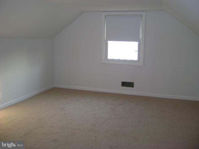 1825 Hanford Road Rosedale, MD 21237 - Photo 3 of 15 a view of a window in an empty room