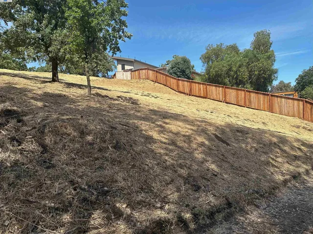 a backyard of a house with seating space