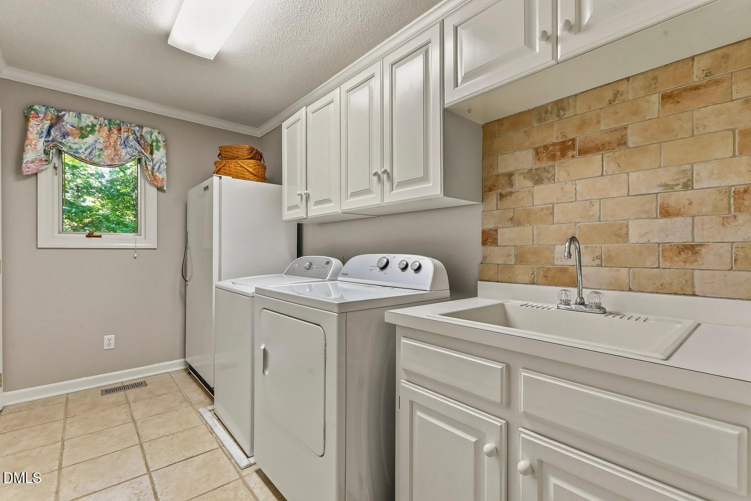 8208 Aberloch Court Raleigh, NC 27606 - Photo 40 of 80 058-011-Laundry Room-1500x1000