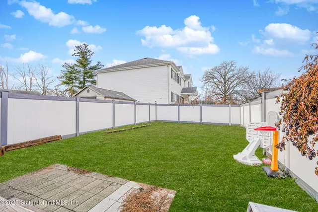 a view of a garden with a slide