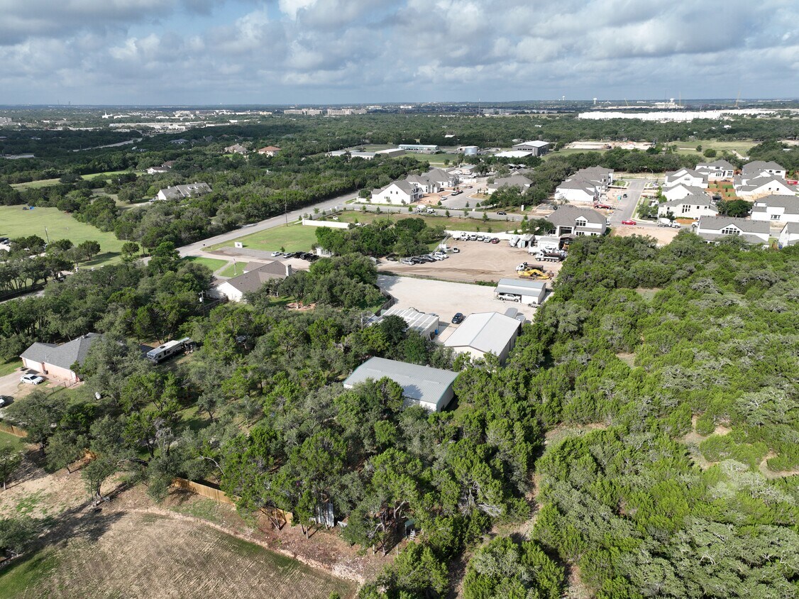 102 County Road 180 Leander, TX 78641 - Photo 5 of 25 Panoramic views encompass sprawling green spaces and a vibrant residential landscape.