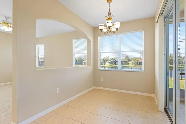 a view of a kitchen with a sink and cabinet area