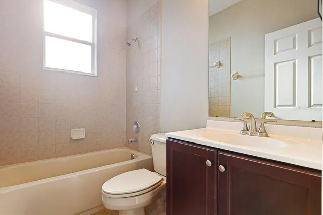 a view of a swimming pool with a yard