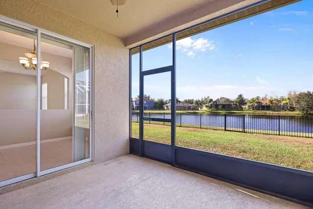a view of a golf course with a lake view