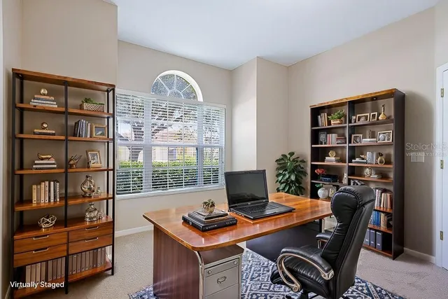 an empty room with a empty space and windows