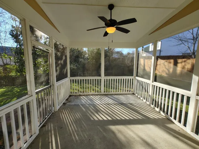 a view of porch with wooden floor
