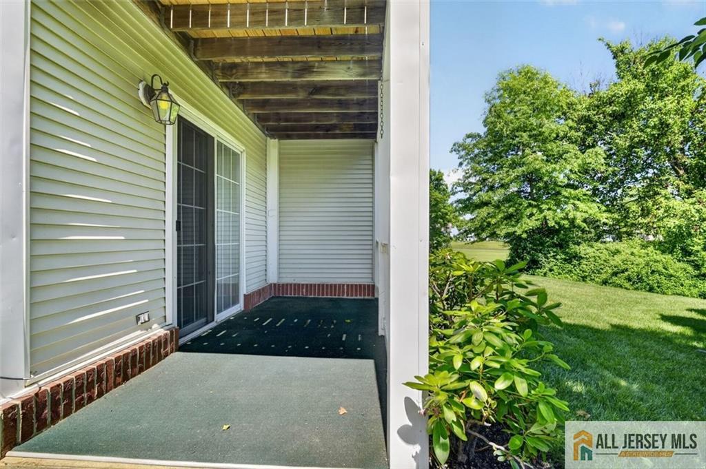 40C Rutland Lane, Unit 40B Monroe Township, NJ 08831 - Photo 27 of 37 a view of backyard with potted plants
