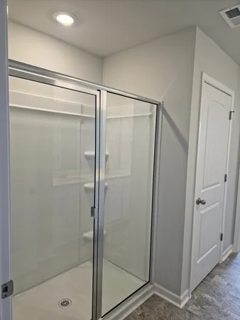 a front view of a house with a large window