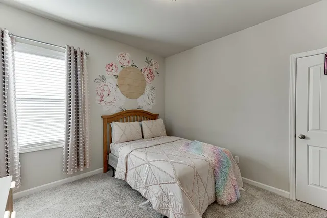 a bathroom with a sink a double vanity and a mirror