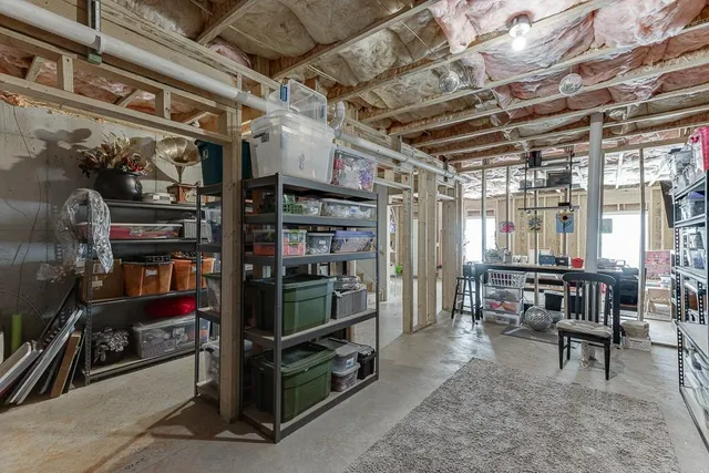 an aerial view of multiple house with parking