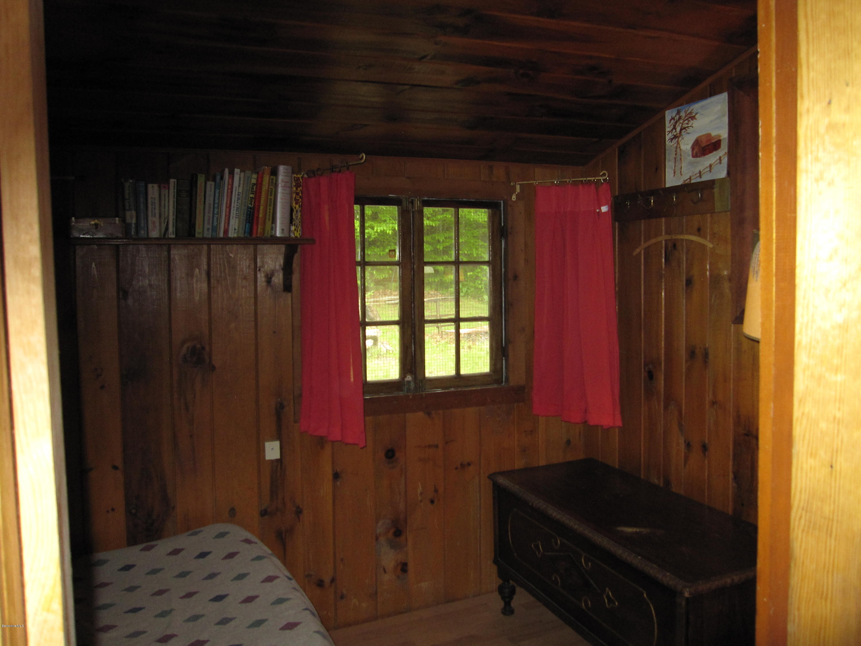 11 Phelps Road Florida, MA 01247 - Photo 7 of 9 a view of a closet area with wooden floor