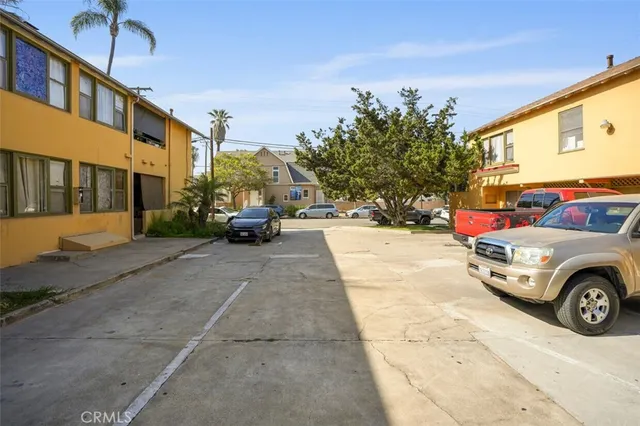 a view of a car parked in front of a building