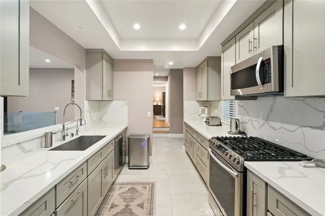 a bathroom with a shower and a sink