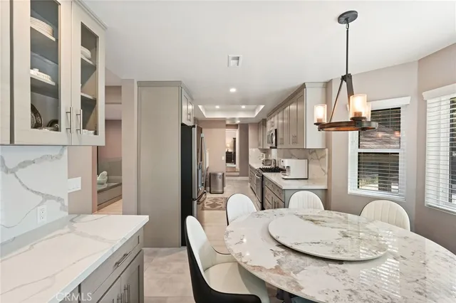 a bedroom with a bed and furniture