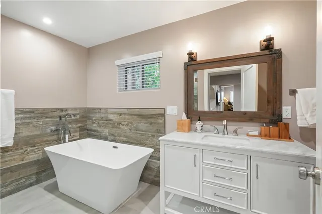 a bedroom with furniture and a couch