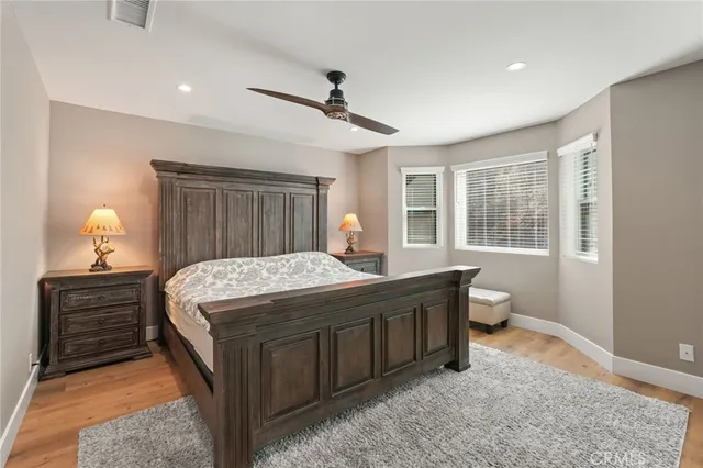 a bathroom with a toilet a sink and shower