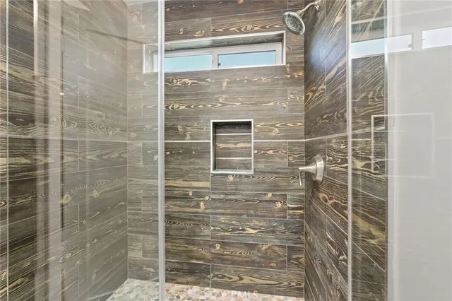 a view of a room with kitchen wooden floor and windows